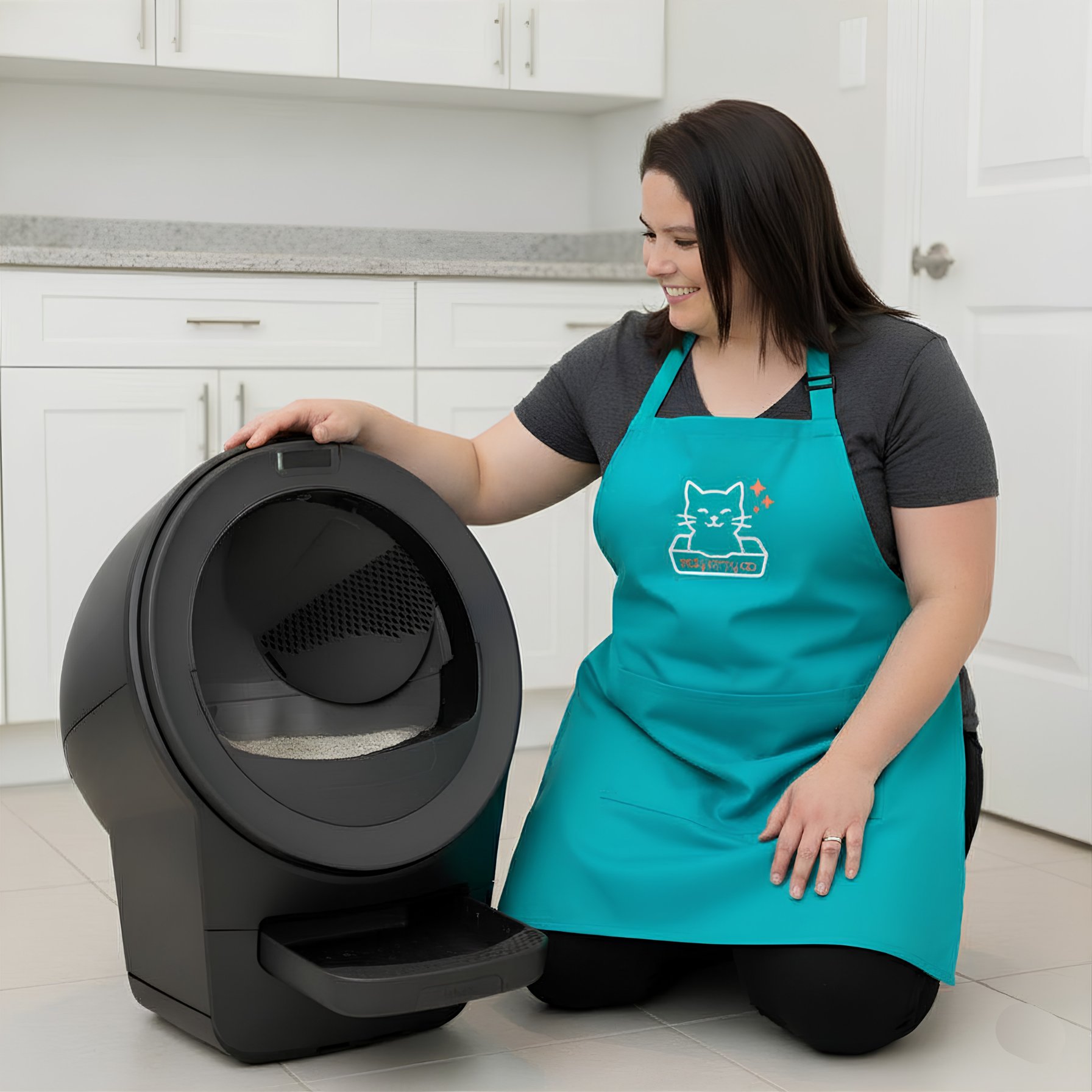 Tidy Kitty Co. founder cleaning a Litter-Robot